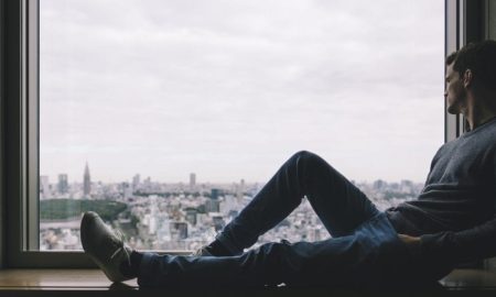 city-man sitting window